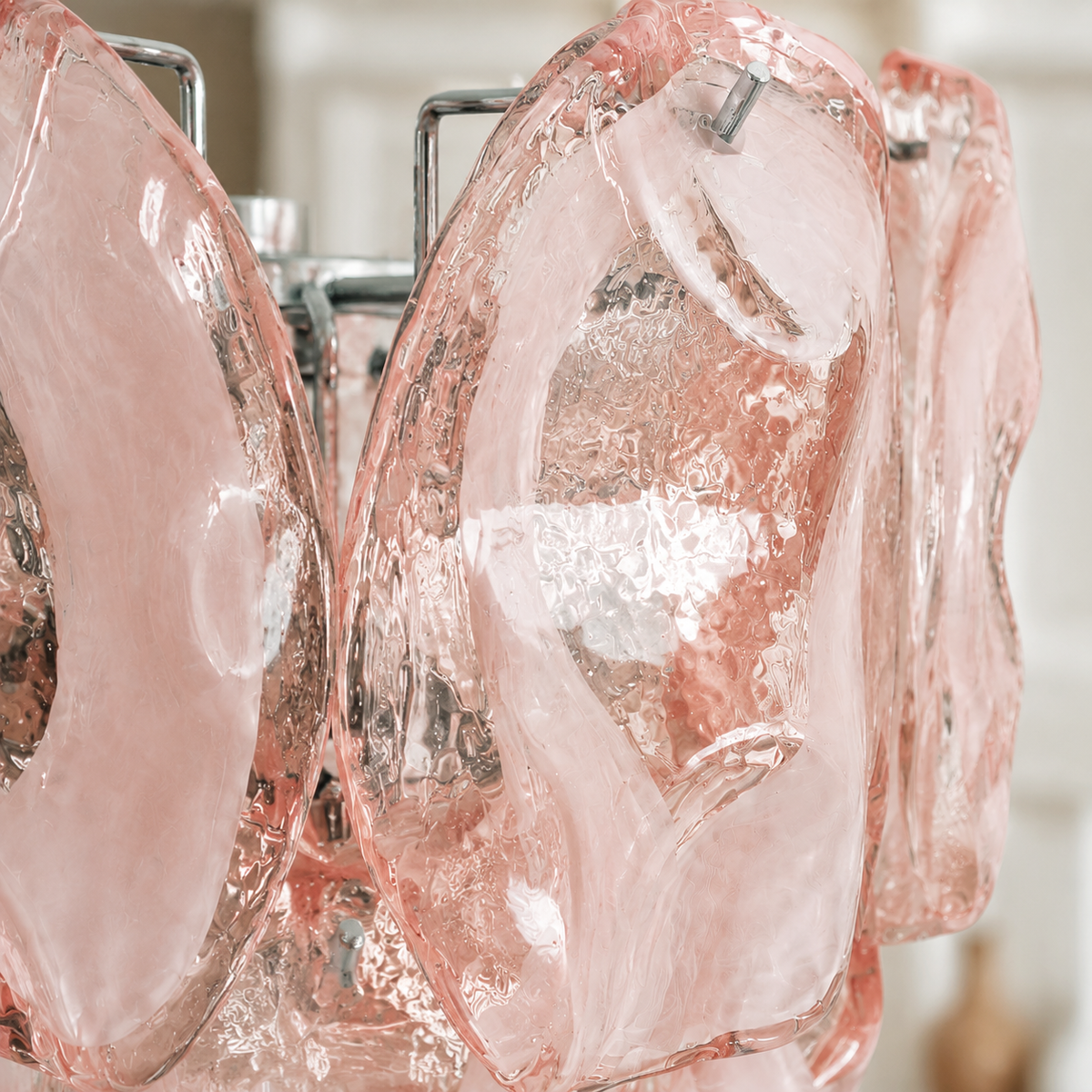 Lucent Petal pink sculpted glass texture and chrome fastening detail