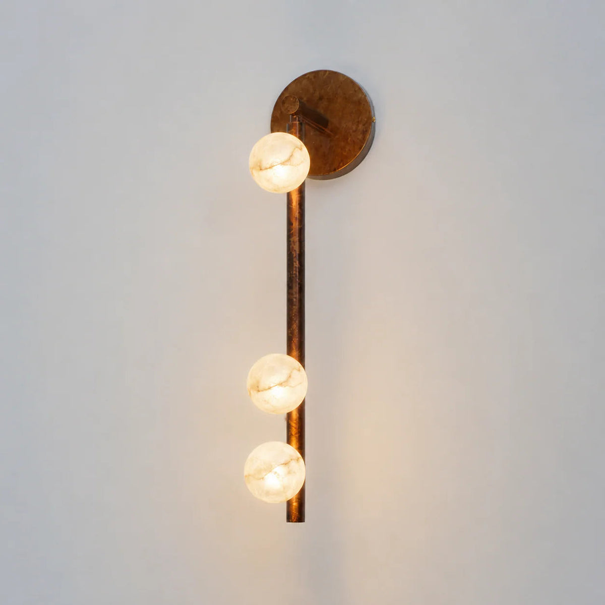Alabaster Orb Asteria Brass Wall Sconce