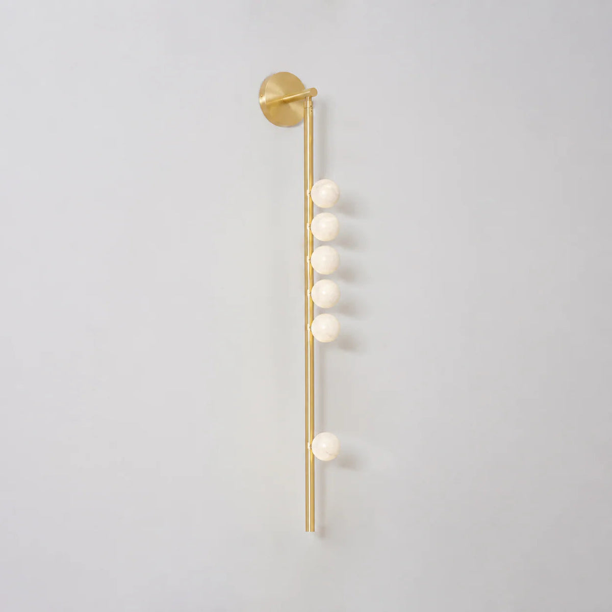 Alabaster Orb Asteria Brass Wall Sconce