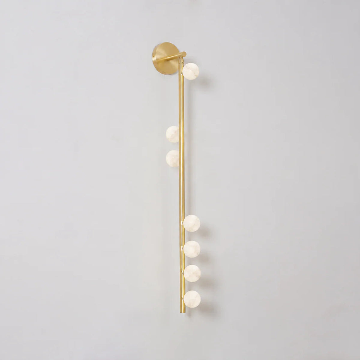Alabaster Orb Asteria Brass Wall Sconce