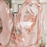 Lucent Petal pink sculpted glass texture and chrome fastening detail
